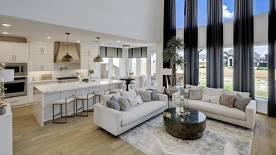 Living room with light wood finished floors, a hi