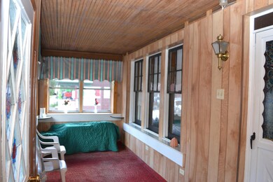Enclosed front porch