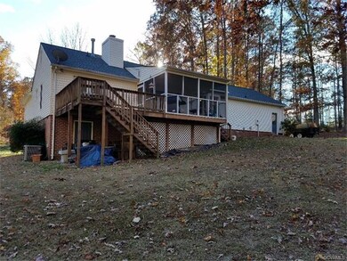 Enjoy the comfort of the large screened porch on t