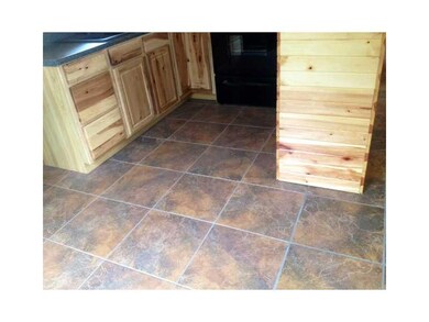 Exterior Front. View of tile. throughout the kitch