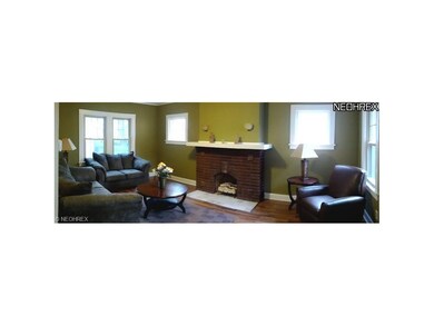 Good Size Living Room with fresh paint, NEW flooring and gas fireplace!