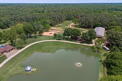 Aerial view of property and surrounding area with 