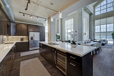 Chef's Kitchen with Quartzite counters, dual wine