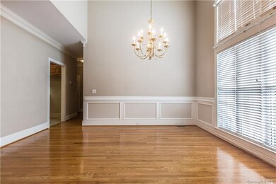 Elegant Dining room with 2 story ceiling and lots 