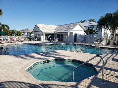 Laurel Oaks Community pool featuring a community hot tub and a patio area