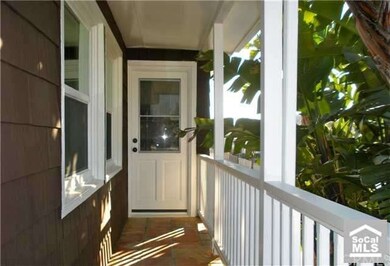 FOLIAGE LINED LANAI WITH SECONDARY ENTRY THROUGH K