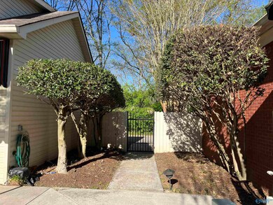 private rear entry from drive way to courtyard