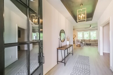 Entrance with custom painted ceiling