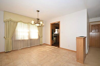 Formal Dining Room with low maintenance tile