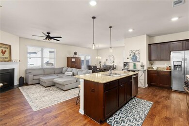 Open floor plan with greatroom, dining and kitchen