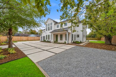 Another view of the front of the home featuring am