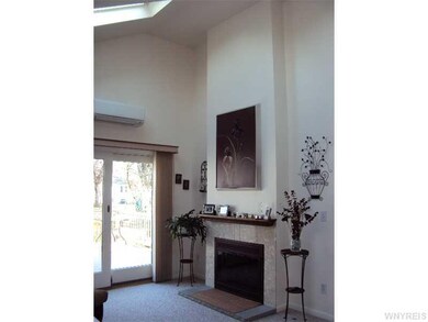 Family Room. vaulted ceiling gas fireplace