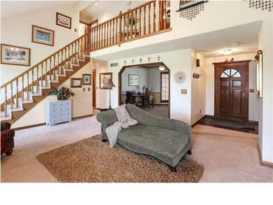 Upstairs there are bedrooms and a bathroom.
