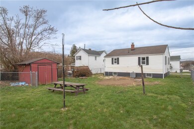 A great level fenced in back yard for your kids to