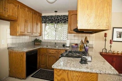 Granite Counters and Oak Cabinets in your kitchen 