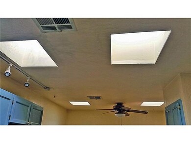 Kitchen. Skylights and track lighting.