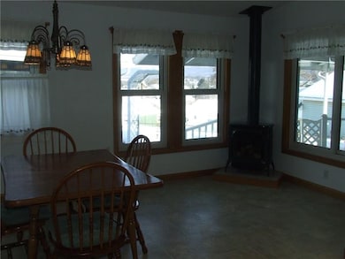 Dining room w/ comfortable gas stove