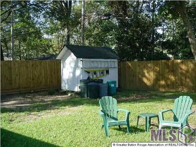 Large fenced Backyard with Storge Bldg