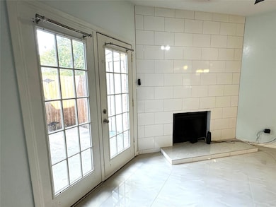 Entryway featuring light tile patterned floors