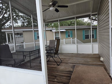 Wooden deck with ceiling fan