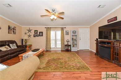 Great room with vaulted ceiling, and upgraded floo