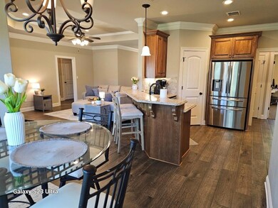 Kitchen with stainless steel fridge with ice dispe