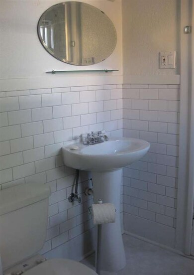 Newly tiled bath w/new sinks