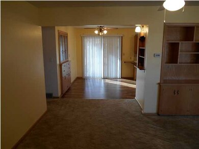LOOKING FROM FRONT DOOR TO DINING ROOM