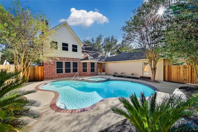 Another view of backyard pool, new fence surrounds the yard