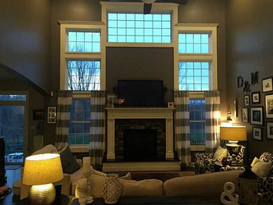 Den/Family/Great Room. Wall of windows with 18 ft.