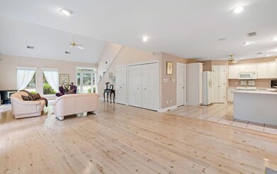 living room opens to kitchen