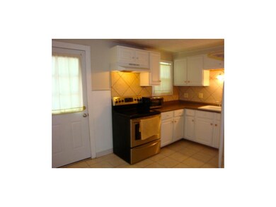 Newer electric stove and tile floors