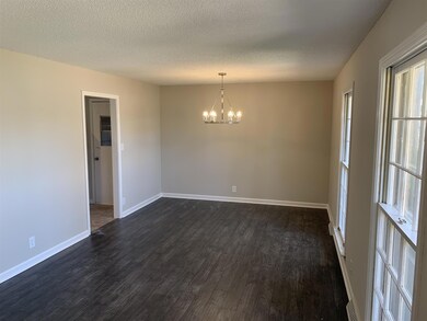 Your new Front room with the formal dinning room. Check out the hardwood flooring