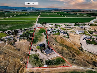 Aerial view at dusk of a view of countryside and property boundaries highlighted