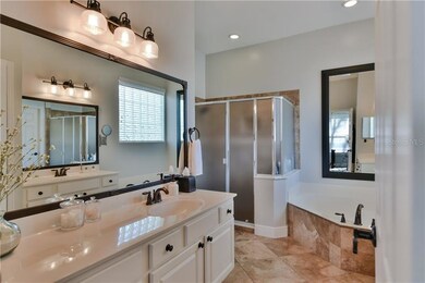 Remodeled master bath with upgraded light fixtures