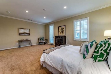 Large master bedroom, balcony to the rigth of the 