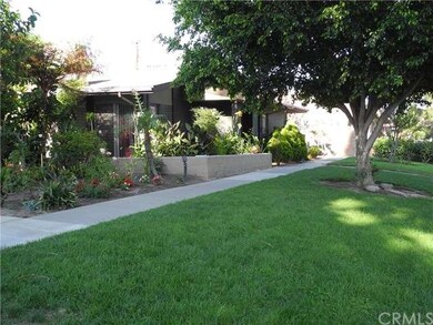 Beautiful gardens surround the unit.