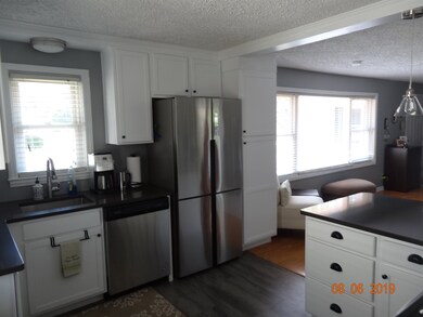 NEW CABINETS, APPLIANCES, QUARTZ COUNTERTOPS AND V