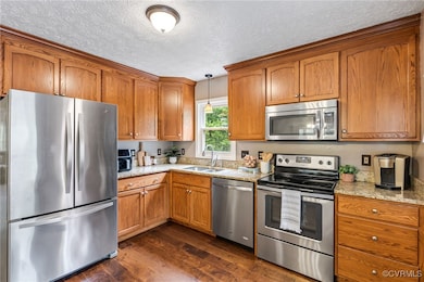 Open-concept dining and kitchen, granite counterto