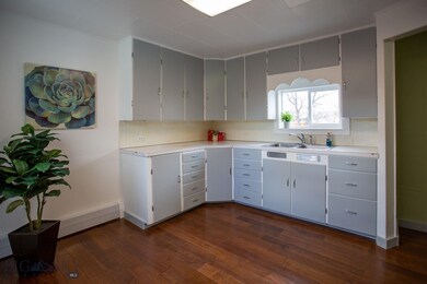 Kitchen with beautiful antiquated cabinetry with p