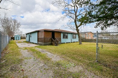 Driveway leads to 2nd home in the back.