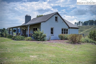 1046 J E Gentry Rd, Crumpler, NC 28617 - photo 7