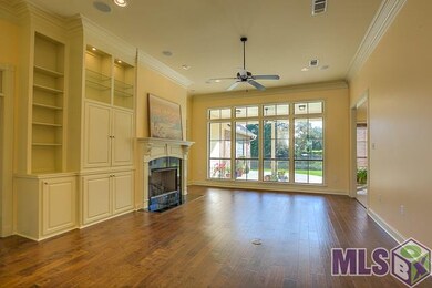View of patio and lake from the living room