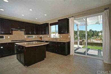 Open concept kitchen with lots of upgrades, island