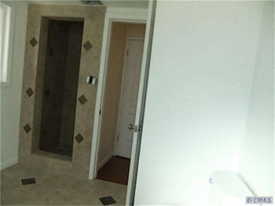 Porcelain Tile w/Mosaic Accents in Both Bathrooms 