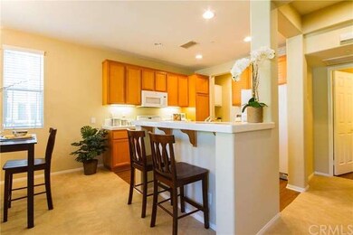 Kitchen opens to the dining area & also features a