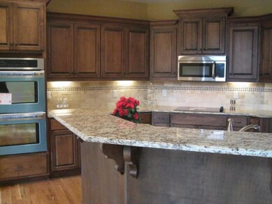 Stunning new appliances await you in this marvelous kitchen. The open floor plan of the home caters to anyone wanting to entertain or keep an eye on children. The kitchen is large enough to host multiple people without bumping elbows! 