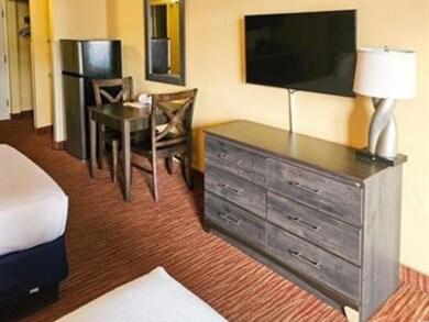Living area featuring carpet flooring