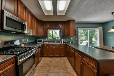 Updated kitchen with STAINLESS STEEL appliances an