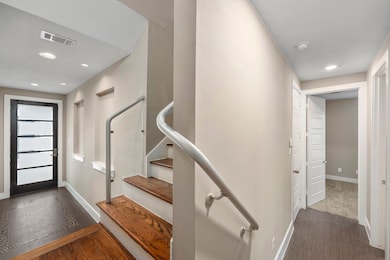 Right off the entryway is the first floor bedroom.